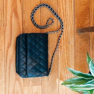 Black faux leather clutch with silver chain strap